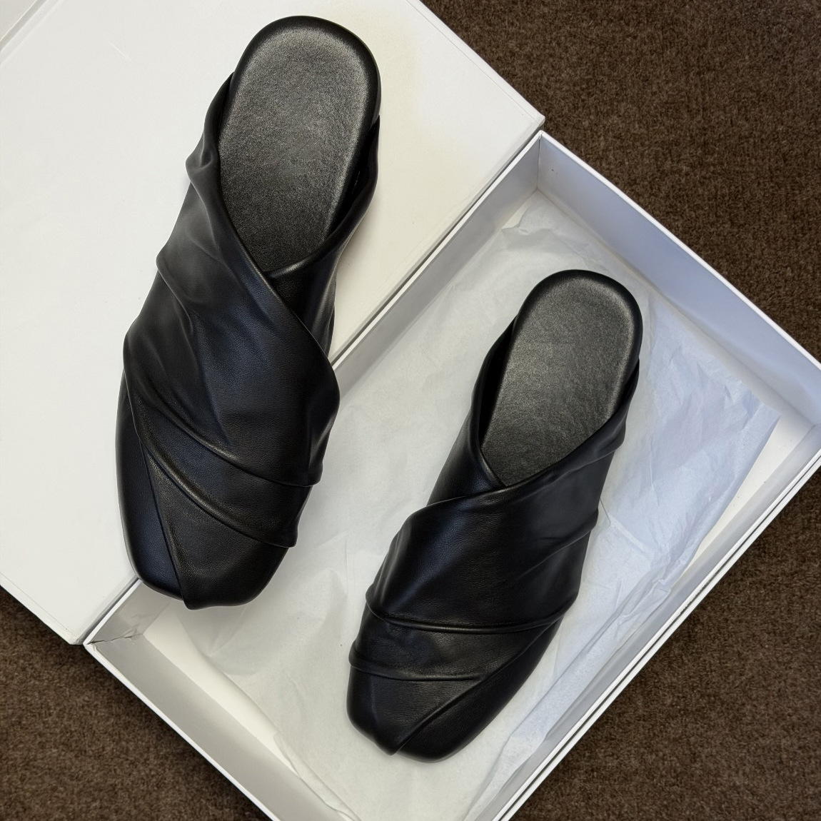 Czarne, skórzane buty w stylu  – Mule Slip On recenzja i cena